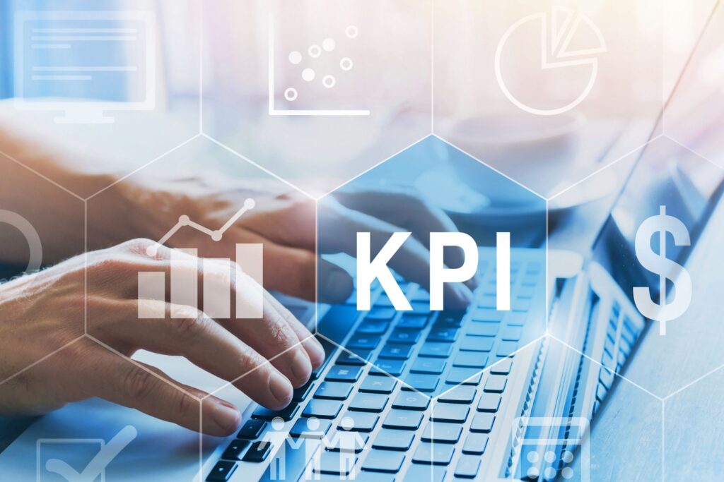 KPIs or KPI (key performance indicator) concept picture, man writing on laptop to search for KPIs